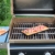 Rosenstein & Söhne Räucherbretter: 4 Zedernholz-Grillbretter für Holzkohle- & Gasgrills, mit Metallrahmen (Zedernholz-Bretter) - 5